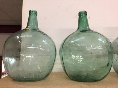 Lot 332 - Group of five large glass Spanish wine bottles/ carboys