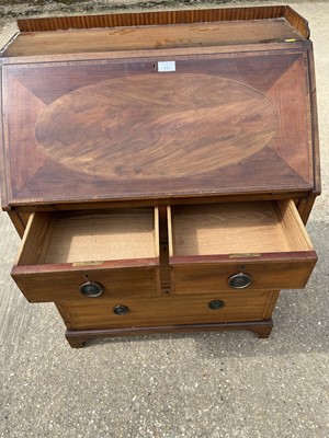 Lot 72 - Edwardian inlaid mahogany bureau with fitted interior above two short and two long drawers
