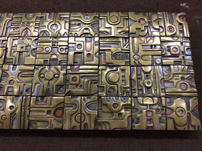 Lot 670 - Brass wall sculpture by Giovanni Schoeman, framed