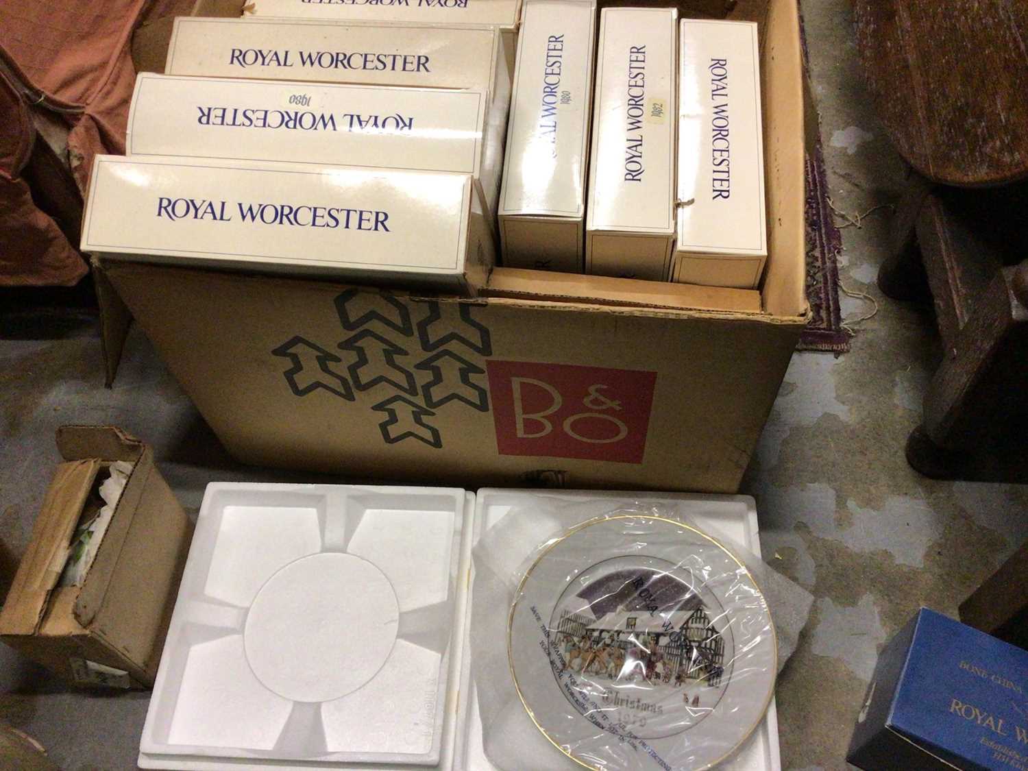 Lot 673 - Royal Worcester Christmas Plates 1979-1982 together with a large quantity of boxed Royal Worcester ornaments (2 boxes)