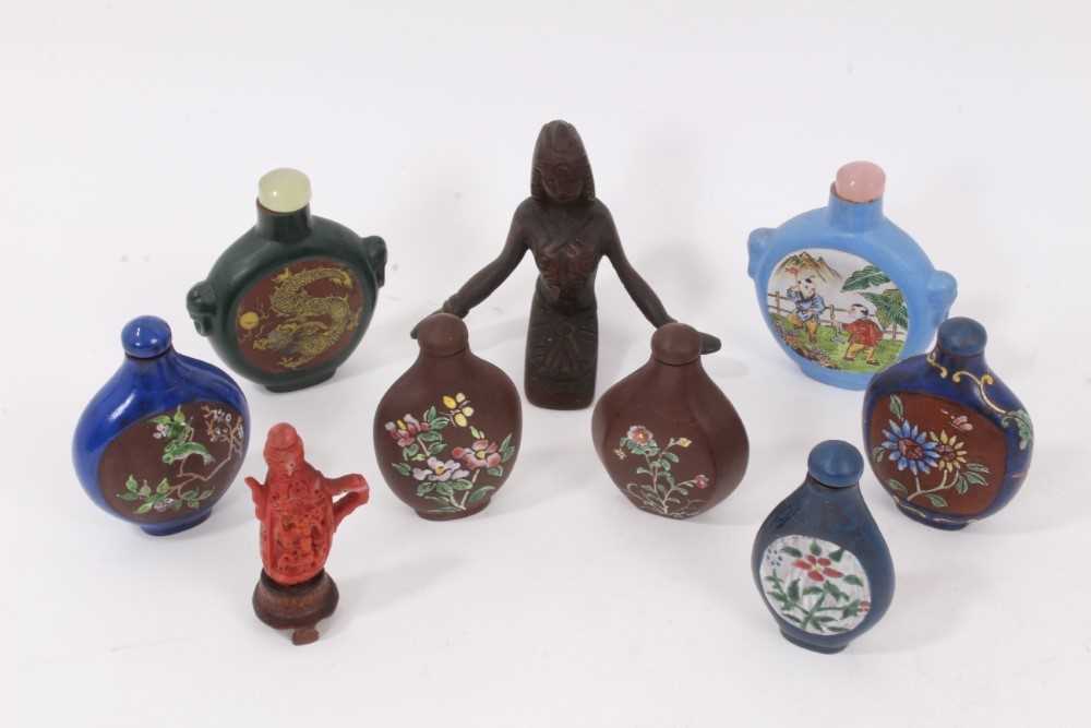 Lot 791 - Small collection of Chinese ceramic and glass snuff bottles, together with a Chinese bronze figural sculpture. (9)