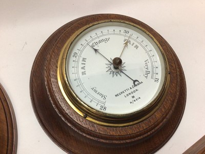 Lot 2430 - Three Negretti & Zambra oak barometers