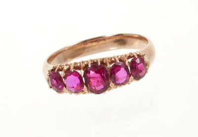 Lot 532 - Victorian ruby five-stone ring with five graduated oval mixed cut rubies in gold claw setting on gold shank