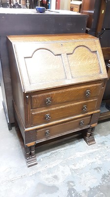 Lot 1058 - 1930's oak bureau with three drawers, 75cm wide, 47cm deep, 104cm high