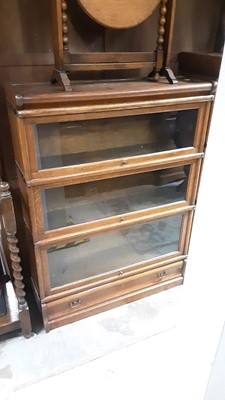 Lot 1060 - Early 20th century oak three tier Globe Wernike bookcase with drawer below, 87cm wide, 27cm deep, 116cm high