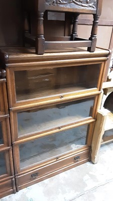 Lot 1061 - Early 20th century oak three tier Globe Wernicke bookcase with drawer below, 87cm wide, 31cm deep, 124.5cm high