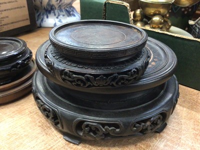 Lot 86 - Four Chinese carved wood stands