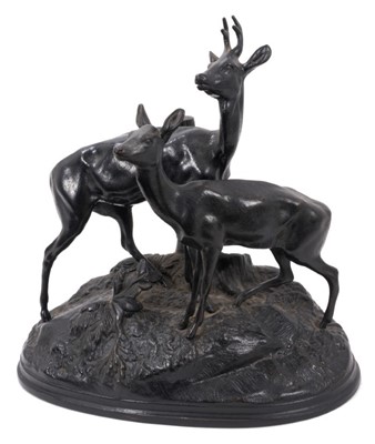 Lot 954 - Russian cast iron sculpture of two deer, on naturalistic base, 35cm long