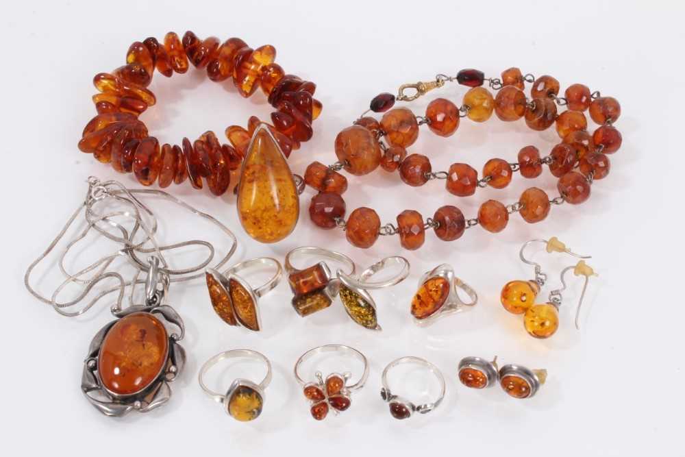 Lot 872 - Group of silver mounted amber jewellery