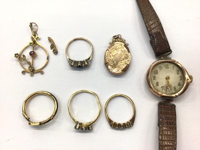 Lot 822 - Antique yellow metal ring, 18ct gold diamond set ring, one other diamond three stone ring, 9ct gold gem set ring, 9ct gold seed pearl pendant, yellow metal locket and 9ct gold cased wristwatch on l...