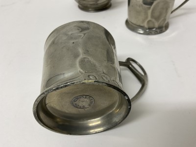 Lot 145 - Art Nouveau pewter mounted decanter and two German pewter cups