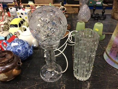 Lot 130 - A cut and etched glass lamp with floral decoration, in the style of Waterford, 35cm high, together with a Czech glass vase (2)