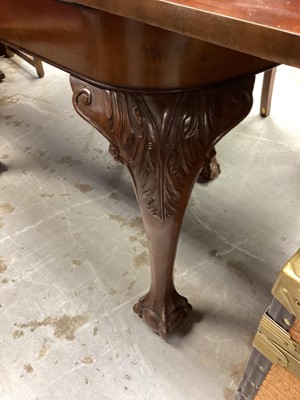 Lot 1080 - 1920's mahogany extending dining table with one extra leaf on carved cabriole legs with claw and ball feet, opening to 185cm x 107.5cm, together with a set of four matching dining chairs with pierc...