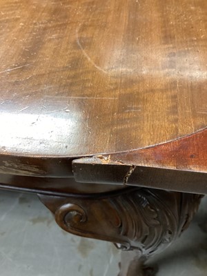 Lot 1080 - 1920's mahogany extending dining table with one extra leaf on carved cabriole legs with claw and ball feet, opening to 185cm x 107.5cm, together with a set of four matching dining chairs with pierc...