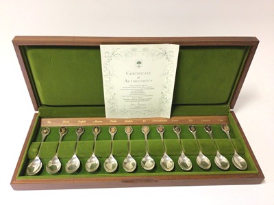 Lot 199 - Set of twelve contemporary silver Royal Horticultural Society spoons with 24 carat gold cameos