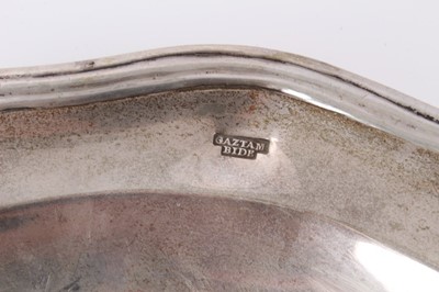 Lot 248 - Edwardian silver tray of oval form, with reeded border, on four paw feet (London 1906) Peter Henderson Deere, all at approximately 14ozs. 25cm overall width, together with a heavy Continental white...
