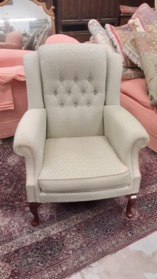 Lot 1111 - Contemporary armchair with buttoned green upholstery on cabriole front legs