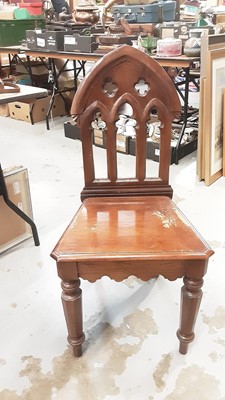 Lot 1114 - Victorian Gothic hall chair with pierced decoration on faceted front legs