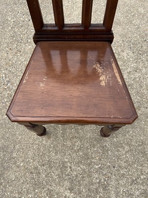 Lot 70 - Victorian Gothic hall chair with pierced decoration on faceted front legs