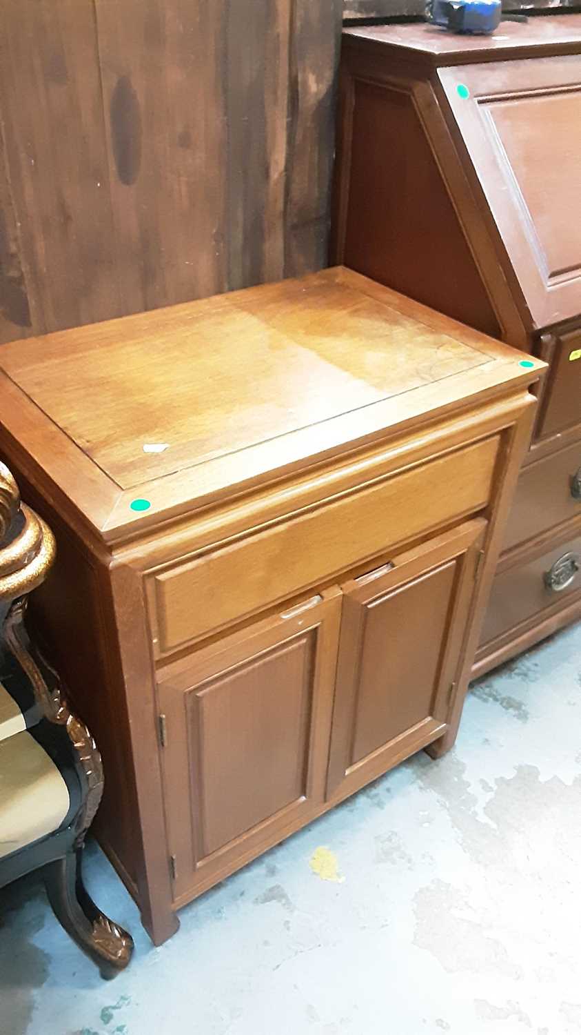 Lot 1117 - Oriental hardwood chest with single drawer and two doors below, 61cm wide, 41cm deep, 76cm high