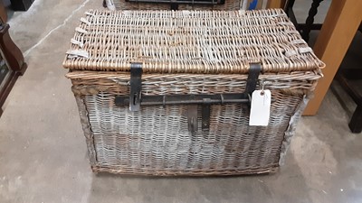 Lot 1119 - Two wicker baskets with hinged lids and rope handles, 77cm wide, 42cm deep, 51cm high and 72cm wide, 42cm deep,  50cm high