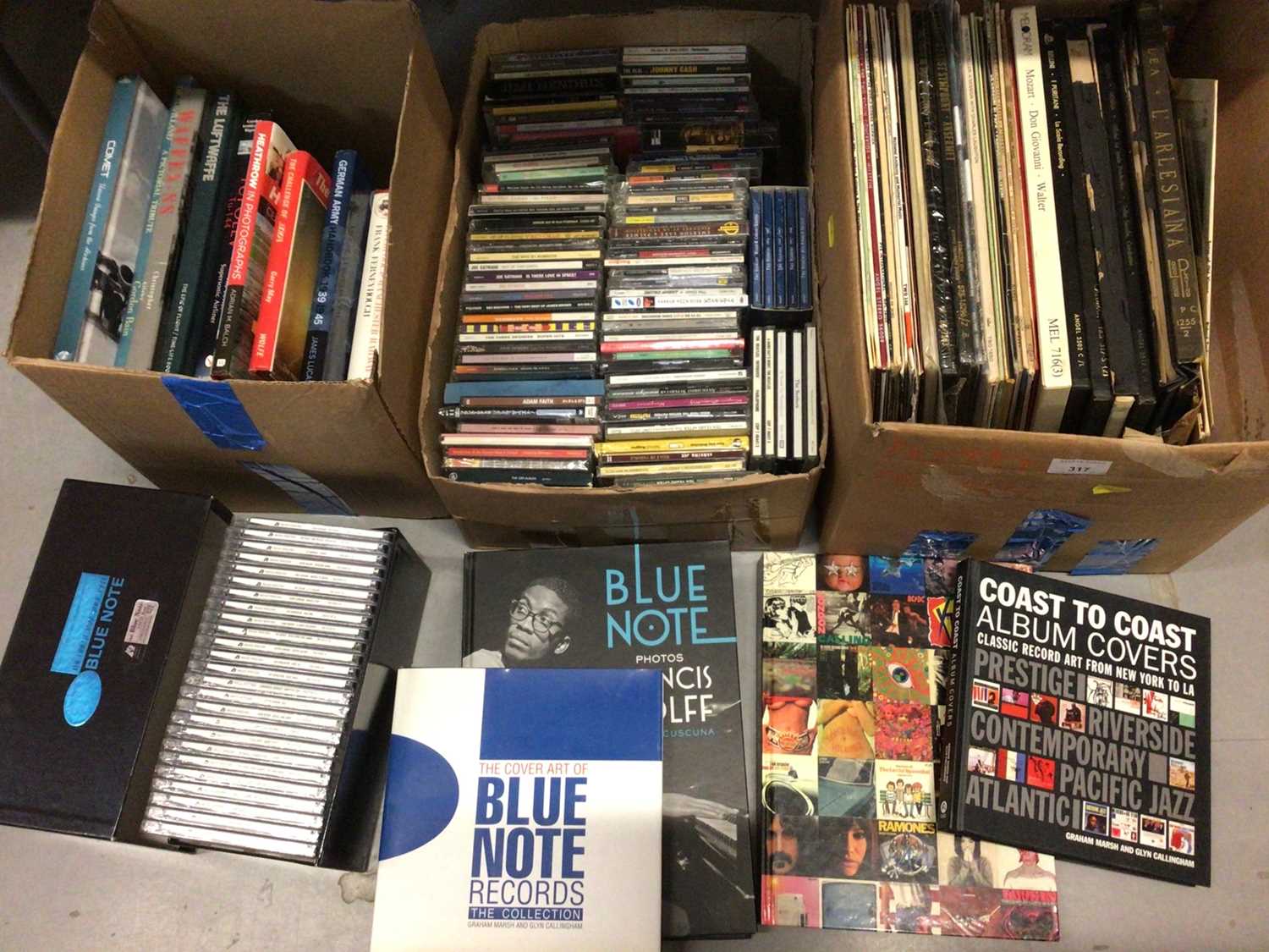 Lot 317 - Group of LP records, CDs including Jazz Blue Note boxed set, similar related books, The Art of the LP Classic Album Covers by Morgan and Wardle, plus some military and aircraft books