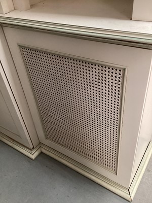 Lot 1132 - Georgian style white and green painted two height breakfront bookcase with adjustable shelves above, two central panelled doors below flanked by two caned doors, 252cm wide, 45.5cm deep, 223cm high