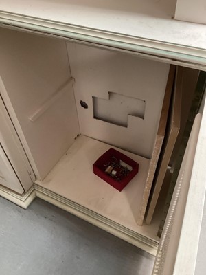 Lot 1132 - Georgian style white and green painted two height breakfront bookcase with adjustable shelves above, two central panelled doors below flanked by two caned doors, 252cm wide, 45.5cm deep, 223cm high