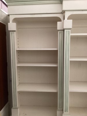 Lot 1132 - Georgian style white and green painted two height breakfront bookcase with adjustable shelves above, two central panelled doors below flanked by two caned doors, 252cm wide, 45.5cm deep, 223cm high