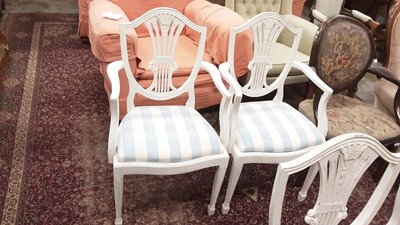 Lot 1133 - Set of six white painted Hepplewhite dining chairs with drop in seats on square taper legs and spade feet, comprising two carvers and four standards