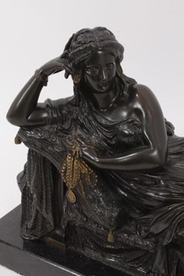 Lot 843 - 19th century Grand Tour bronze depicting Cleopatra reclining, raised on black marble plinth