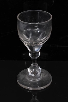 Lot 143 - Georgian air twist wine glass with trumpet bowl, together with a Continental wine glass with blue and white spiral twist stem and another small glass (3)