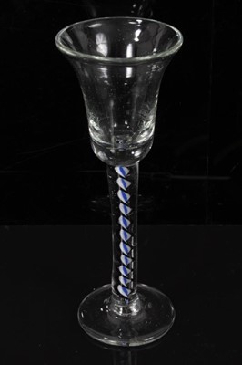 Lot 143 - Georgian air twist wine glass with trumpet bowl, together with a Continental wine glass with blue and white spiral twist stem and another small glass (3)