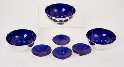 Lot 263 - A set of three Danish modernist silver dishes with blue enameled interiors, and four others