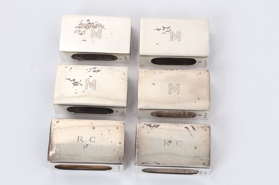 Lot 264 - Set of four 1930s silver matchbox covers of rectangular form, with engraved initial M (Birmingham 1939) William Neale & Son Ltd, together with a similar pair, with engraved initials R.C (Birmingham...