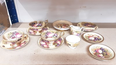 Lot 343 - Three Aynsley Orchard Gold fruit pattern cups and four saucers together with milk jug and sugar bowl, footed dish and two small plates - 12 pieces  (the three cups, milk jug and sugar bowl are all...