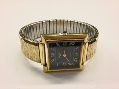 Lot 829 - 1970s Longines gold plated automatic wristwatch with black square dial and Roman numeral markers