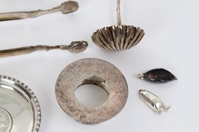 Lot 270 - Selection of miscellaneous silver and white metal, including tea strainer, Indian silver dish and other items