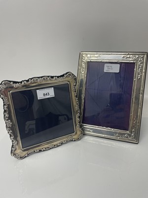 Lot 843 - Contemporary silver mounted photograph frame with scroll foliate border, together with another silver mounted frame (2)