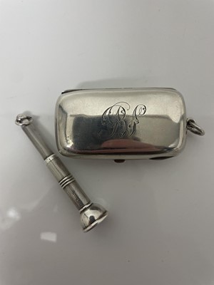 Lot 845 - Late Victorian silver cheroot case of rounded rectangular form, (Chester 1900), together with a silver cigar pricker with engine turned decoration (2)