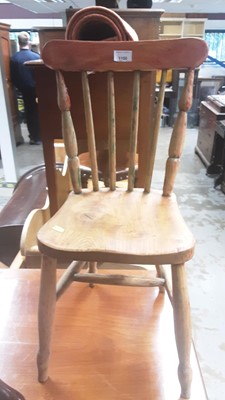 Lot 1150 - Children's stick back chair and an oak blanket box (2)