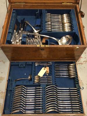 Lot 301 - Part set of silver plated  Fiddle, shell and thread cutlery in an oak canteen.