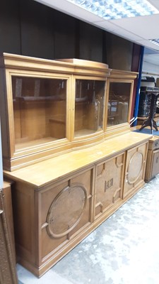 Lot 1523 - Early 20th century Continental golden oak two height sideboard with three glazed doors above enclosing shelves and three burr walnut veneered doors below, 250cm wide, 74cm deep, 183cm high