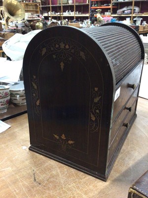 Lot 225 - Roll top cabinet with brass inlay, 34cm high