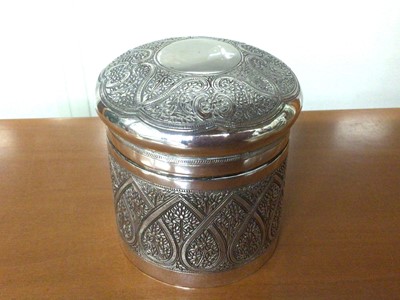 Lot 879 - Islamic white metal lidded pot with engraved foliate pattern, 8cm high