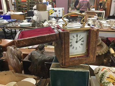 Lot 448 - Brass carriage clock in leather travelling case.