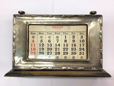 Lot 883 - 1920s silver mounted desk calendar