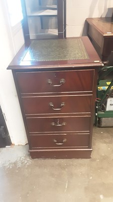 Lot 1158 - Reproduction mahogany filing cabinet with inset leather top.