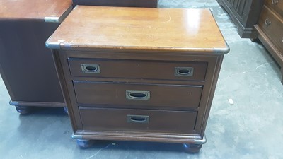 Lot 1157 - Pair of campaign style chests of drawers