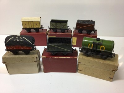 Lot 275 - Trix OO gauge rolling stock including bogie high capacity wagons, dump, plank, open sided, container wagons and private owner, boxed (34)
